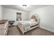 Bright bedroom with a comfortable bed and plenty of natural light at 5035 Villa Rica Hwy, Dallas, GA 30157