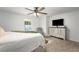 Main bedroom with king-size bed, dresser, and a view at 5035 Villa Rica Hwy, Dallas, GA 30157