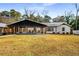 Modern farmhouse exterior with a covered porch at 5035 Villa Rica Hwy, Dallas, GA 30157