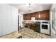 Functional laundry room with cabinets and tile floors at 5035 Villa Rica Hwy, Dallas, GA 30157