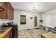 Laundry room with built-in shelving and tile flooring at 5035 Villa Rica Hwy, Dallas, GA 30157