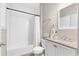 Clean bathroom with subway tile, a bathtub, and a modern vanity at 698 Rochelle Sw Dr, Atlanta, GA 30310