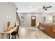 Living room with hardwood floors and built-in desk at 698 Rochelle Sw Dr, Atlanta, GA 30310