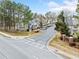 Townhome community overview, showing building arrangement and parking spaces at 900 Tree Creek Blvd, Lawrenceville, GA 30043