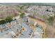 Aerial perspective of the townhome community, showcasing its location and surroundings at 900 Tree Creek Blvd, Lawrenceville, GA 30043