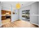 Bright dining area with hardwood floors and kitchen access at 900 Tree Creek Blvd, Lawrenceville, GA 30043