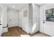 Bright hallway with hardwood floors and built-in cabinets at 2359 Melinda Ne Dr, Atlanta, GA 30345