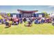 Exterior view of the Greystone Amphitheater with a lawn full of people enjoying a performance at 2808 Lillian Ln, Douglasville, GA 30135
