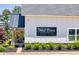 The West Pines Golf Club features a well-manicured lawn and charming, modern farmhouse-style architecture at 2808 Lillian Ln, Douglasville, GA 30135