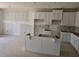 Unfinished kitchen with white cabinetry offers space to create your dream culinary space at 2808 Lillian Ln, Douglasville, GA 30135