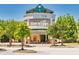 Arbor Place shopping center exterior with inviting entrance and surrounding trees, offering a premier shopping experience at 2808 Lillian Ln, Douglasville, GA 30135