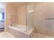 A luxurious bathroom features a soaking tub with glass shower enclosure and modern fixtures at 3630 Peachtree Ne Rd # 2706, Atlanta, GA 30326