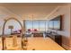 Kitchen with marble countertops overlooking living room at 3630 Peachtree Ne Rd # 2706, Atlanta, GA 30326