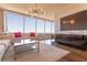 Bright living room with floor-to-ceiling windows and city views at 3630 Peachtree Ne Rd # 2706, Atlanta, GA 30326
