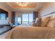 This primary bedroom boasts a tray ceiling, designer furnishings, and an incredible view at 3630 Peachtree Ne Rd # 2706, Atlanta, GA 30326