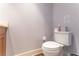 This half bathroom has a white toilet and neutral walls at 3630 Peachtree Ne Rd # 2706, Atlanta, GA 30326