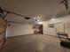 Spacious garage with ample storage shelving and overhead door at 4308 Glenlake Court Northwest, Kennesaw, GA 30144