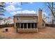 Back of house showing screened porch at 4308 Glenlake Court Northwest, Kennesaw, GA 30144