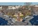 Aerial view of town square with surrounding streets and parked cars at 1401 Walcutts Nw Way, Marietta, GA 30064