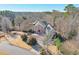 Elegant two-story home with large driveway and mature trees at 1401 Walcutts Nw Way, Marietta, GA 30064