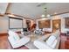 Finished basement with a home theatre setup and hardwood floors at 1401 Walcutts Nw Way, Marietta, GA 30064