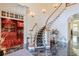 Grand entryway with a curved staircase and marble floors at 1401 Walcutts Nw Way, Marietta, GA 30064