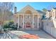 Brick home with grand entrance, columns and red doors at 1401 Walcutts Nw Way, Marietta, GA 30064