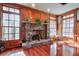 Stone fireplace with wood mantel and hardwood floors at 1401 Walcutts Nw Way, Marietta, GA 30064