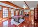 Game room with pool table, hardwood floors, and plenty of natural light at 1401 Walcutts Nw Way, Marietta, GA 30064