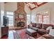 Gathering room with stone fireplace, hardwood floors and leather furniture at 1401 Walcutts Nw Way, Marietta, GA 30064