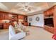 Spacious Gathering room with built-in shelving, comfortable seating, and a large TV at 1401 Walcutts Nw Way, Marietta, GA 30064