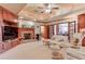Gathering room with fireplace, hardwood floors, and French doors leading to another room at 1401 Walcutts Nw Way, Marietta, GA 30064