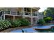 Brick home with a beautiful pool and landscaping at 1401 Walcutts Nw Way, Marietta, GA 30064