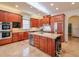 Gourmet kitchen featuring granite countertops and stainless steel appliances at 1401 Walcutts Nw Way, Marietta, GA 30064