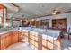 Large kitchen with an island, ample counter space, and hardwood floors at 1401 Walcutts Nw Way, Marietta, GA 30064