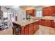Large kitchen island with granite countertops and breakfast bar at 1401 Walcutts Nw Way, Marietta, GA 30064
