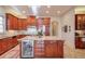 Island kitchen with granite countertops and wood cabinets at 1401 Walcutts Nw Way, Marietta, GA 30064
