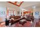 Spacious living room with hardwood floors, leather sofas, and a large window at 1401 Walcutts Nw Way, Marietta, GA 30064