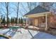 Brick outdoor kitchen with built-in grill and seating at 1401 Walcutts Nw Way, Marietta, GA 30064