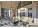Relaxing outdoor patio with seating and ceiling fan at 1401 Walcutts Nw Way, Marietta, GA 30064