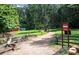 Park trail leading to open grassy area at 1401 Walcutts Nw Way, Marietta, GA 30064