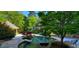 Stunning pool area with lush landscaping and gazebo at 1401 Walcutts Nw Way, Marietta, GA 30064