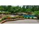 Inviting pool with flagstone patio and landscaping at 1401 Walcutts Nw Way, Marietta, GA 30064