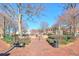Brick pathways, benches & lush landscaping create a charming town square atmosphere at 1401 Walcutts Nw Way, Marietta, GA 30064