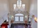 Grand two-story entry with a stunning crystal chandelier and elegant double doors at 1401 Walcutts Nw Way, Marietta, GA 30064