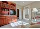 Convenient wet bar with cabinetry and small refrigerator at 1401 Walcutts Nw Way, Marietta, GA 30064