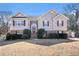 Charming two-story home featuring a brick foundation and red shutters at 230 Cobblestone Ln, Mcdonough, GA 30252