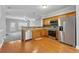 Well-lit kitchen showcases stainless steel appliances, wooden cabinets, and tiled backsplash at 3044 Lauren Parc Rd, Decatur, GA 30032