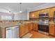 Features stainless steel appliances, wooden cabinets, and countertop in an open layout at 3044 Lauren Parc Rd, Decatur, GA 30032