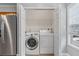 Convenient laundry closet equipped with a modern washer and dryer unit at 3044 Lauren Parc Rd, Decatur, GA 30032